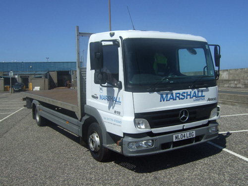 Front view of flatbed lorry